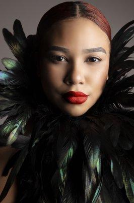 Fashion editorial photo shoot with beautiful feathers