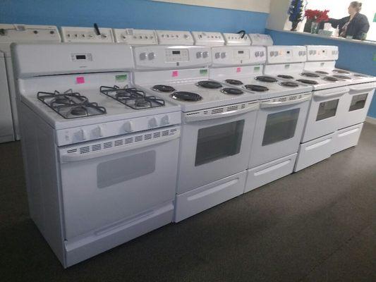 Reconditioned Electric coil top stoves and convection self cleaning ovens in our store.