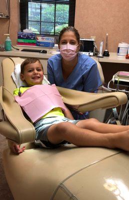 Our amazing dental hygienist treating her beautiful children!! Rachel is caring extremely thorough and gentle.