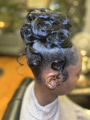 High bun with pin curls