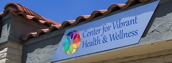 Center for Vibrant Health and Wellness sign in front of business.