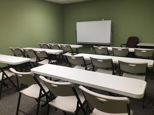 The classroom. This room is also rentable and can hold at least 18 students in this configuration.