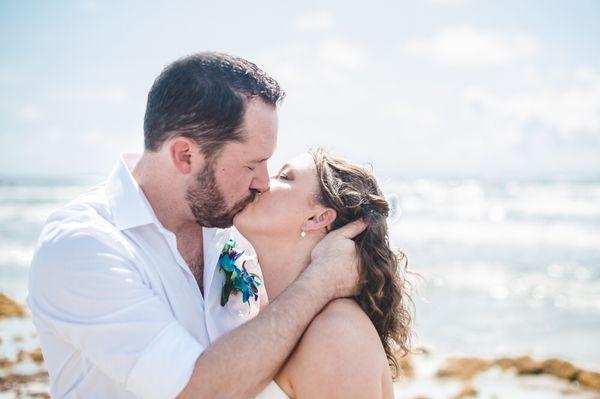 Kristine and Tyler exchanging promises on Port Aransas Beach. Sealed with a kiss!