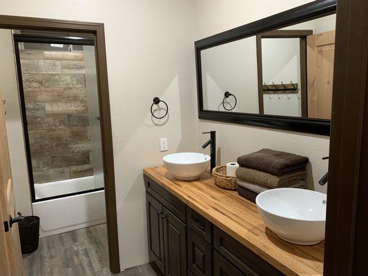 New bathroom remodel with bathroom vanity and sinks