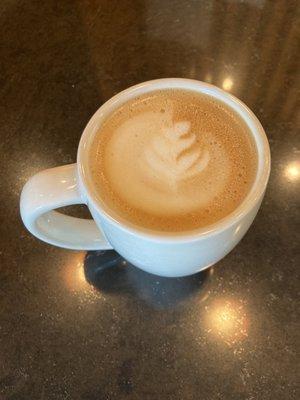 Emily's latte art on a delicious hot oat milk latte!