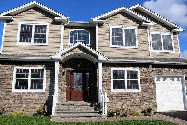 DORMERS, EXTENSION AND SIDING