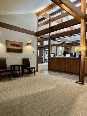 Waiting area, front desk, and patient rooms in the back.