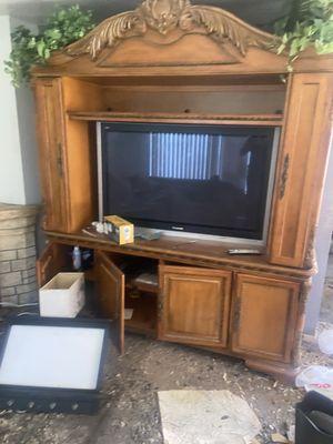 Entertainment center junked after a major fire.