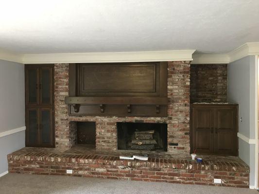 Stained mantle and cabinets