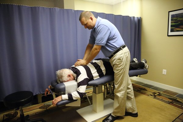 Chiropractic Adjustments with manual therapies