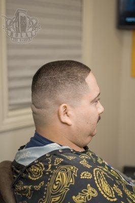 Size #2 clip on top with a skin fade and razored line up.