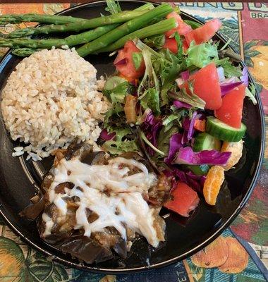 What's for dinner? Eggplant with melted no dairy vegan cheese, brown rice and salad mixed with nuts and fruit