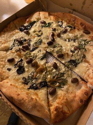 Olive oil garlic base, Kalamata olive, fresh spinach, fresh basil, feta cheese and caramelized onions. Delicious!!