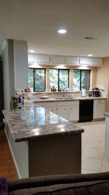 Painted cabinets and custom granite countertops