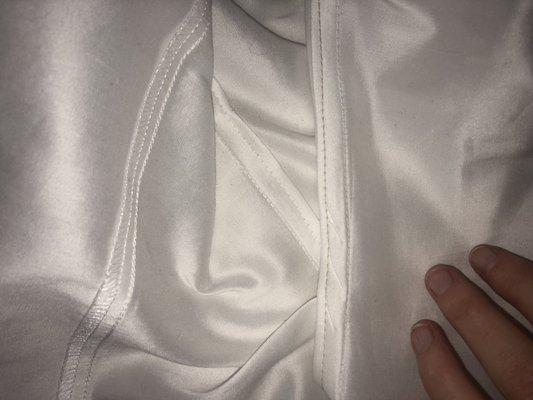 Seam finished with TAN thread on a white shirt... wtf???