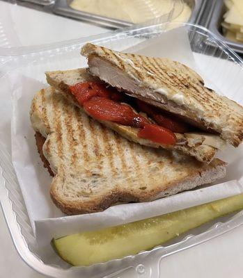 Panini with chicken cutlet, roasted red peppers, fresh mozzarella and balsamic glaze