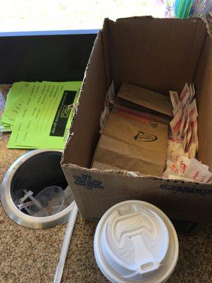 Nothing is stocked-open box of sugar. Notice the pile of help wanted flyers.