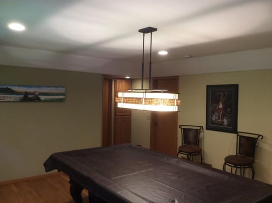 I added the recessed lights around the perimeter of the room and a light centered over the table.