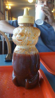 Hot sauce. The only thing here that is spicy, a must try, so yummy!