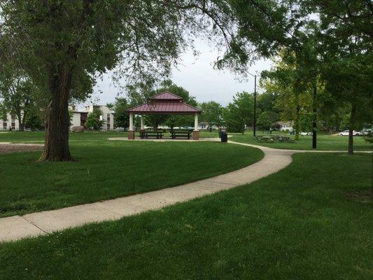 Nice gazebo area with picnic tables. Nice flat sidewalk around the playground good for tricycles and scooters.