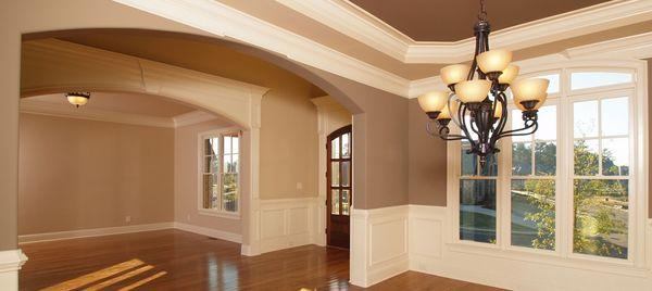 Our professional color consulting gave this living room and foyer the warm and inviting look it needed!