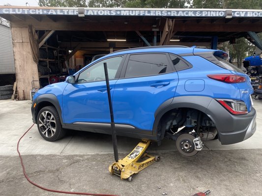 Tire being fixed after it was flat