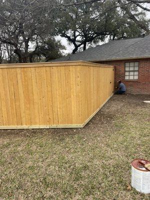 Fence with top cap on it