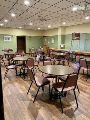 Kennedy Room, adjacent to the lounge with shuffleboard table.