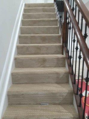 Carpeting a stair case no problem  done