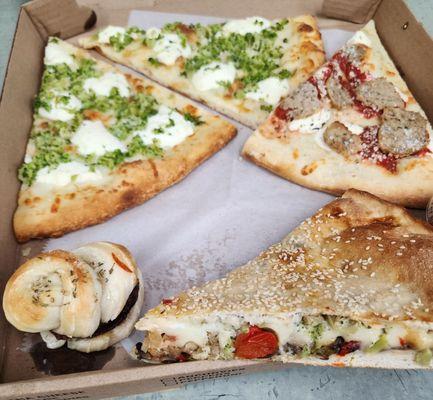 This is my to go box!  Meatball slice, Broccoli, garlic and White pizza slices!  Stuffed Veggie slice and an Eggplant Slider!