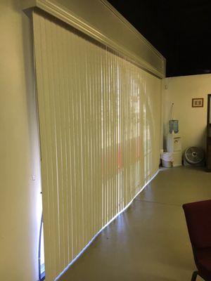 Vertical blinds and a cornice valance over a sixteen foot window!