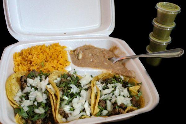 Taco Dinner, steak, cilantro, onion, rice, beans.