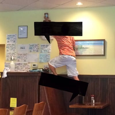 Here's the waiter standing on the table. But according to the president I'm a liar.