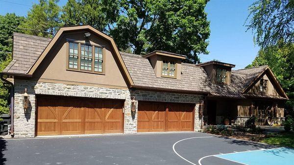 Grand manor roof shingles, copper roof, and custom boral trim installed by the roofers at Daniel Fair Construction in Willow Grove, PA 19090