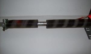 Photo of Broken Torsion Spring.