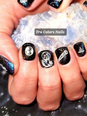 Galaxy cat eye polish with space cat nail stamping