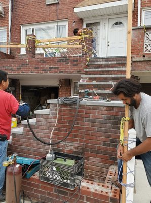 Sunny and crew working on the front steps