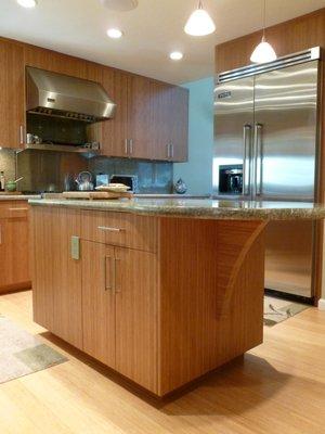 Details matter. Caramelized bamboo kitchen with one-of-a-kind island top support showcasing solid bamboo end-grain.