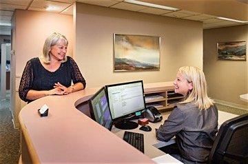 A friendly smile ready to assist as soon as you enter our office