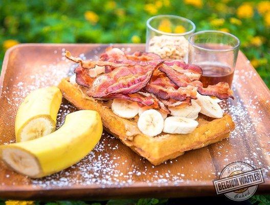 Elvis waffle - Original topped with peanut butter, sliced banana, crispy bacon and syrup