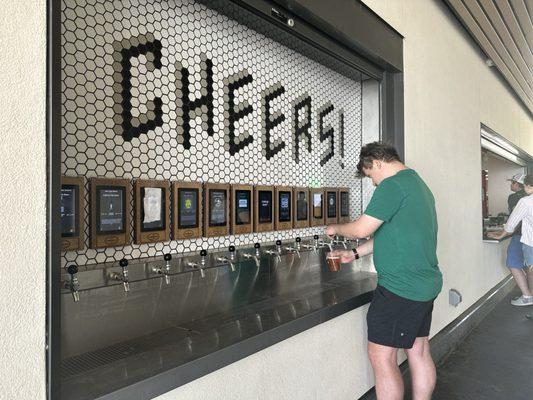 The self pour tech tap! Notice the green in this gentleman's pour, indicating he's clear to pour!