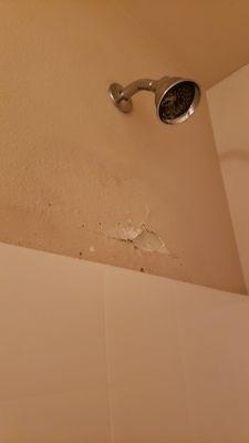 Before photo of wall texture peeling.