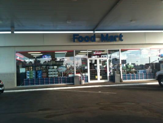 Front of food mart, with address