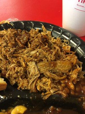 Pulled pork? No smoke flavor or tint. Just brown, mushy meat as if it had been overcooked in a crockpot, partially rewarmed a few days later