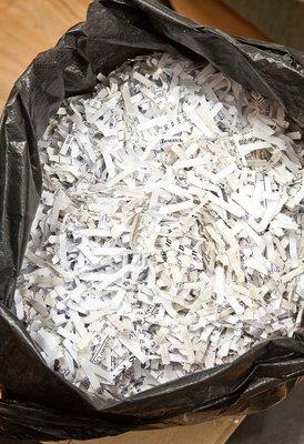 Bag of shredded files before they are sent to be recycled