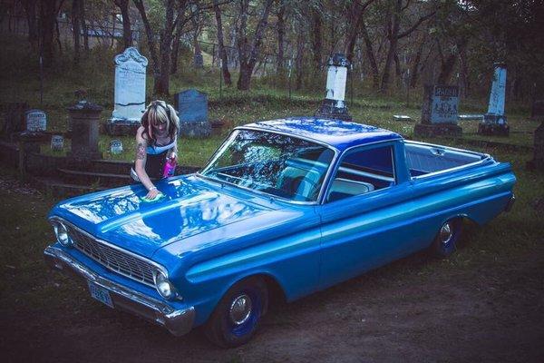 A beautiful customized car and Cadie is finishing.