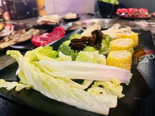 Vegetables and steak ready for hot pot and grill