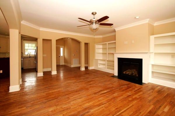 Interior remodel of common area with upgraded trim, flooring, and fire place.