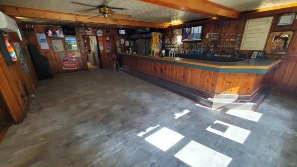 Main bar area with newly renovated floors.