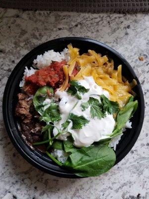 The burrito bowl minus avocado and tomatoes